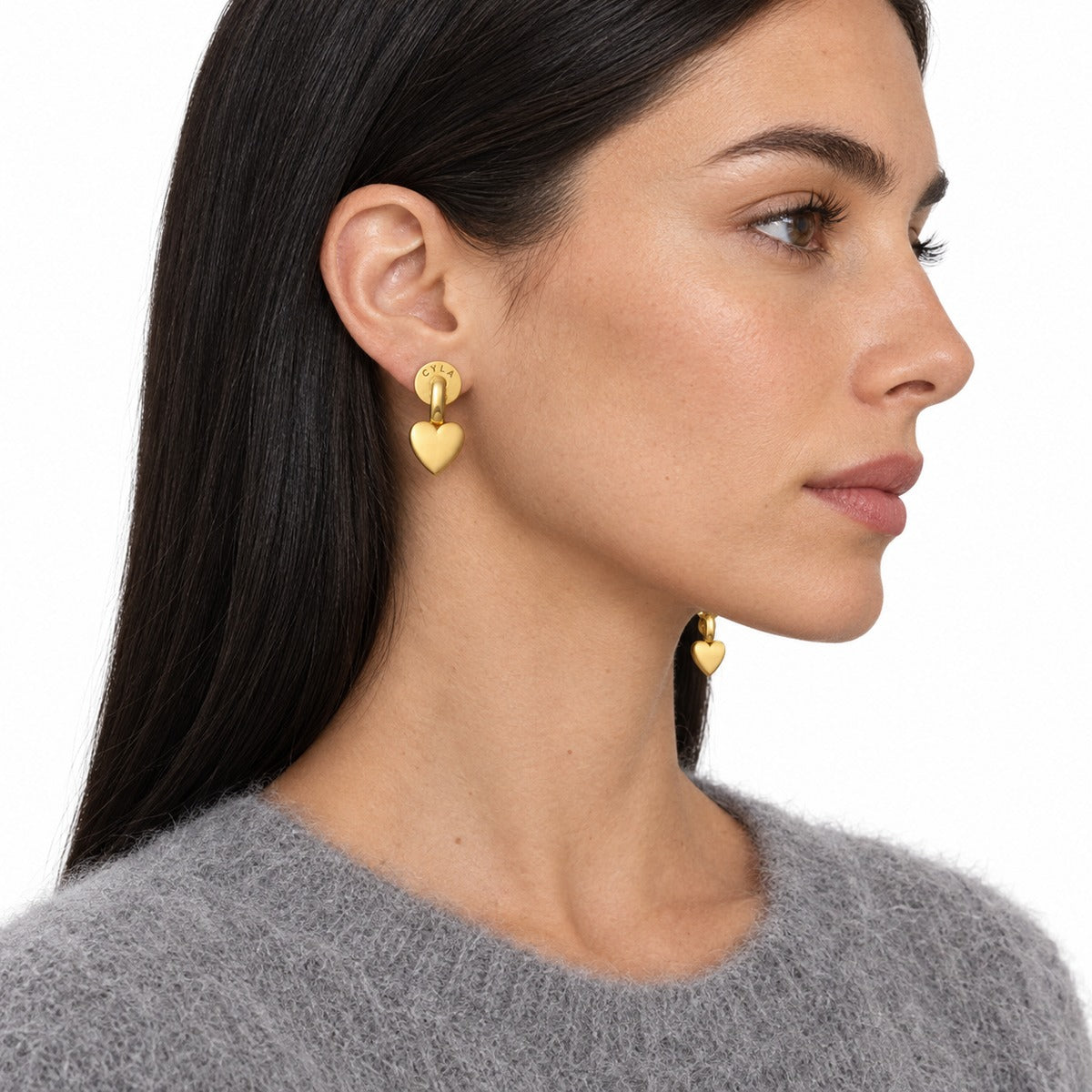 Bold Heart Drop Earrings on model